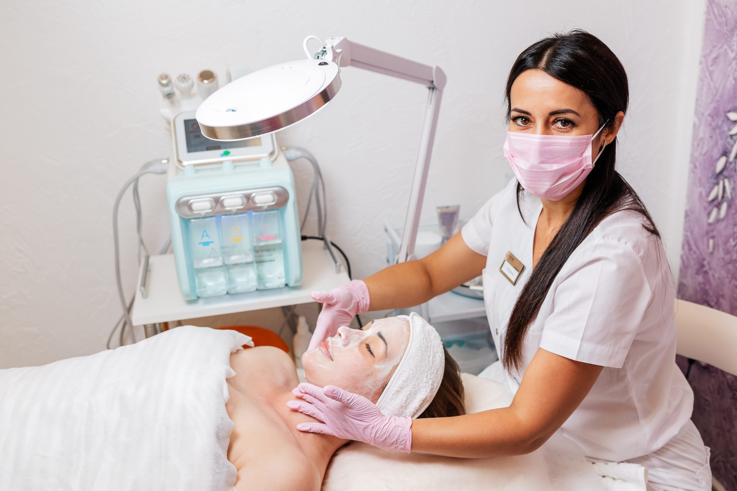 A Cosmetologist in a Medical Mask