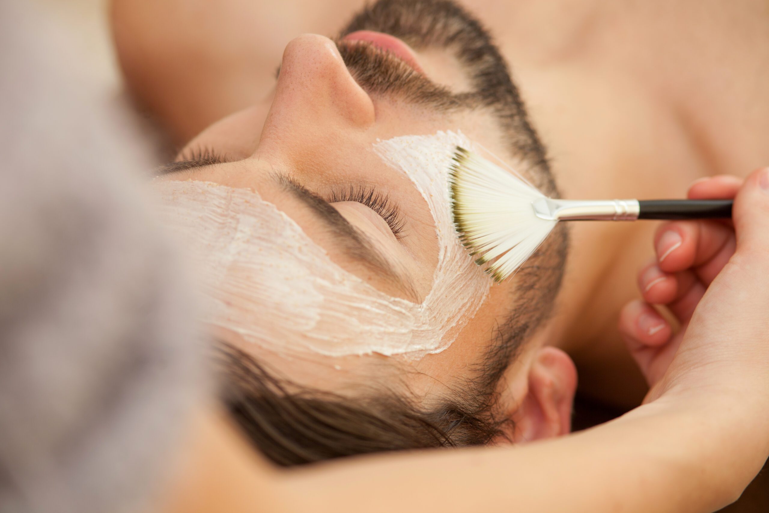 Man Receiving Facial Treatment
